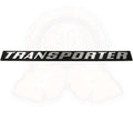 "Transporter" badge for the rear hatch of a Vanagon. Replaces "Vanagon" badge on the rear hatch.